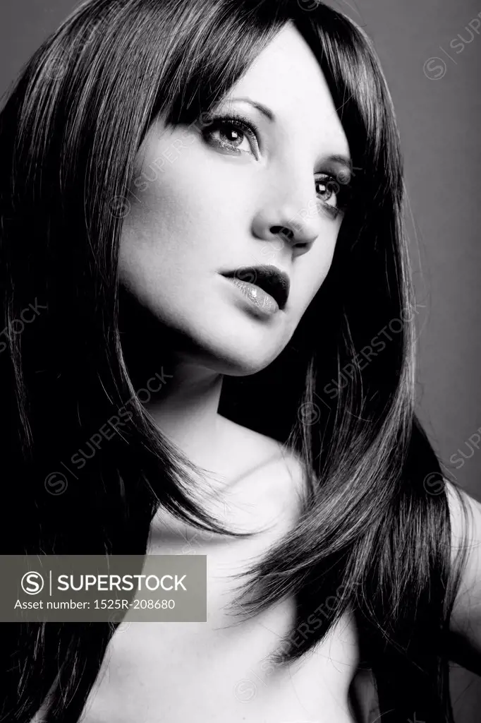 Portrait of the young sexual woman closeup. The Black-and-white photo