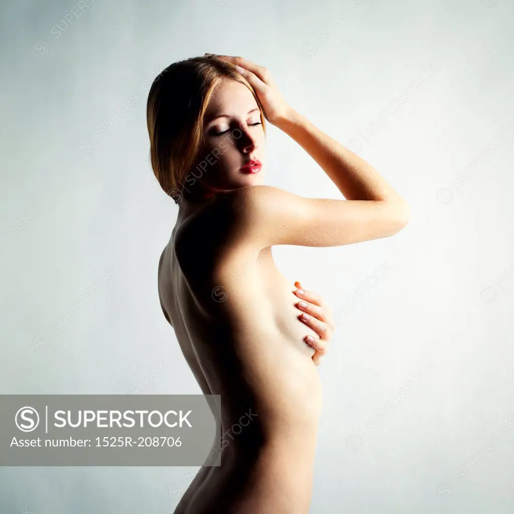 Fashion photo of a beautiful nude woman