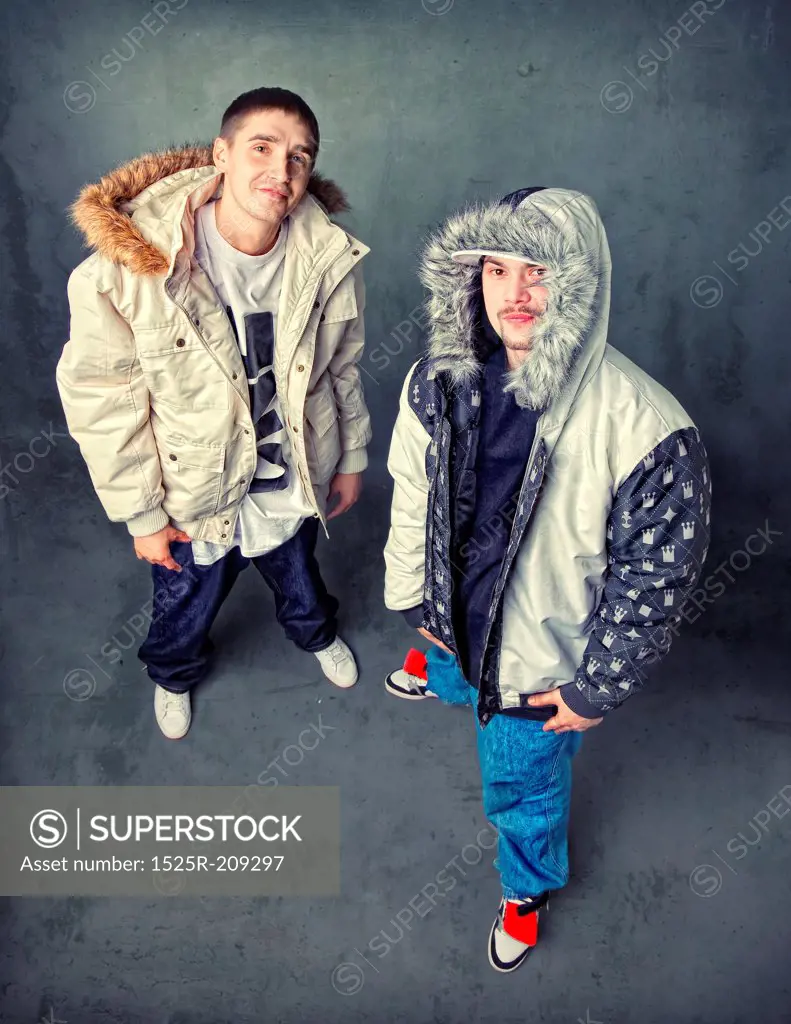 two young cool boys, looking to camera studio photo