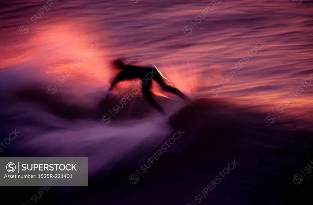 Man surfing motion blur