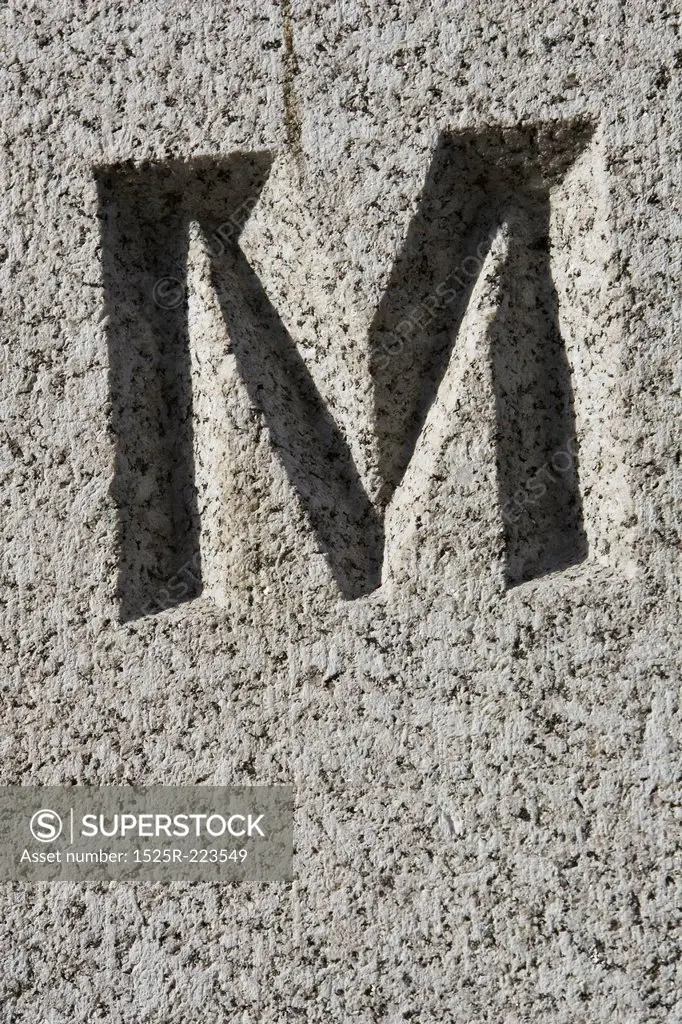 Stone letter M