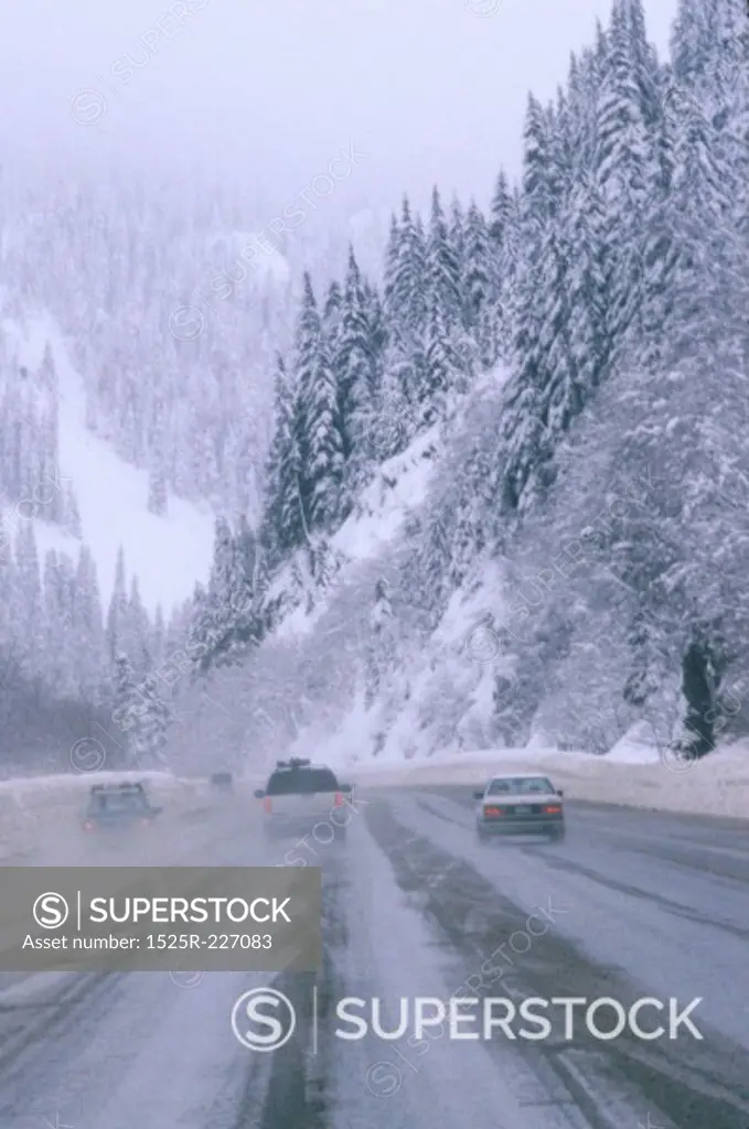 Cars on Snowy Mountain Pass