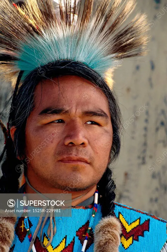 Native American Man in Traditional Clothes