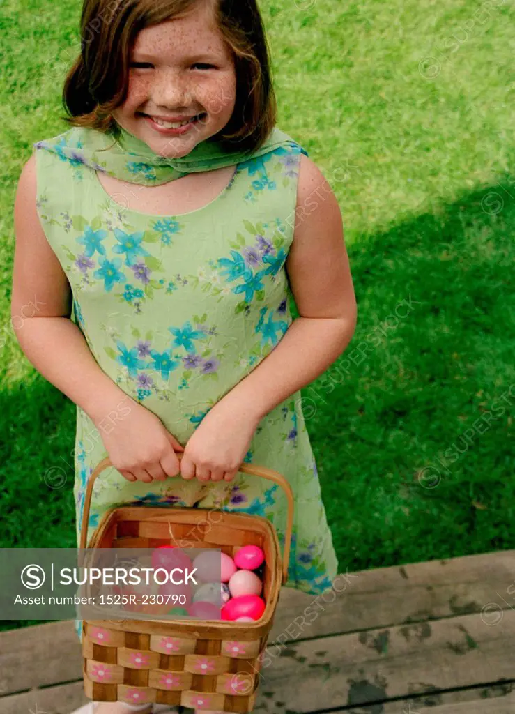 Little Girl With Basket of Easter Eggs