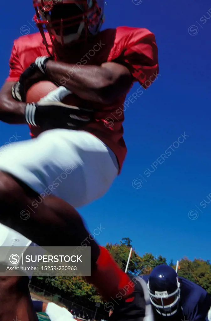 Football Player Running with Ball