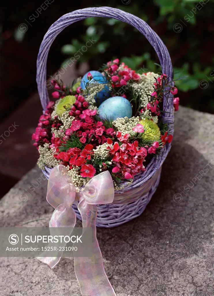 Basket of Flowers and Easter Eggs