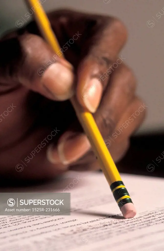 Hand Holding a Pencil