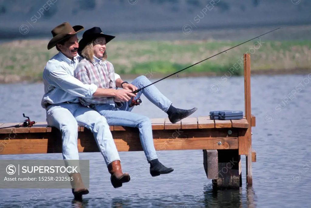Western Couple Fishing Off a Dock