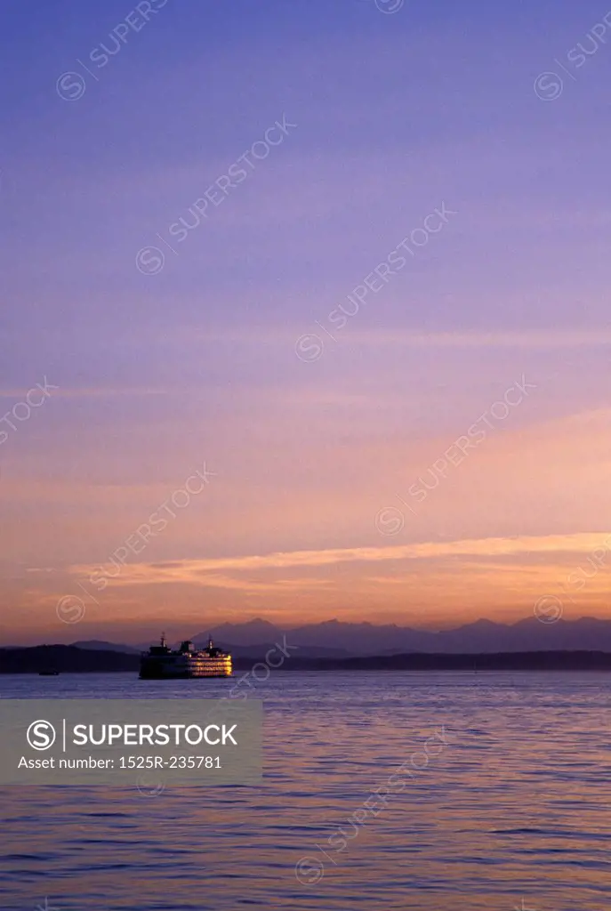 Cruise Ship Floating in Bay at Sunset