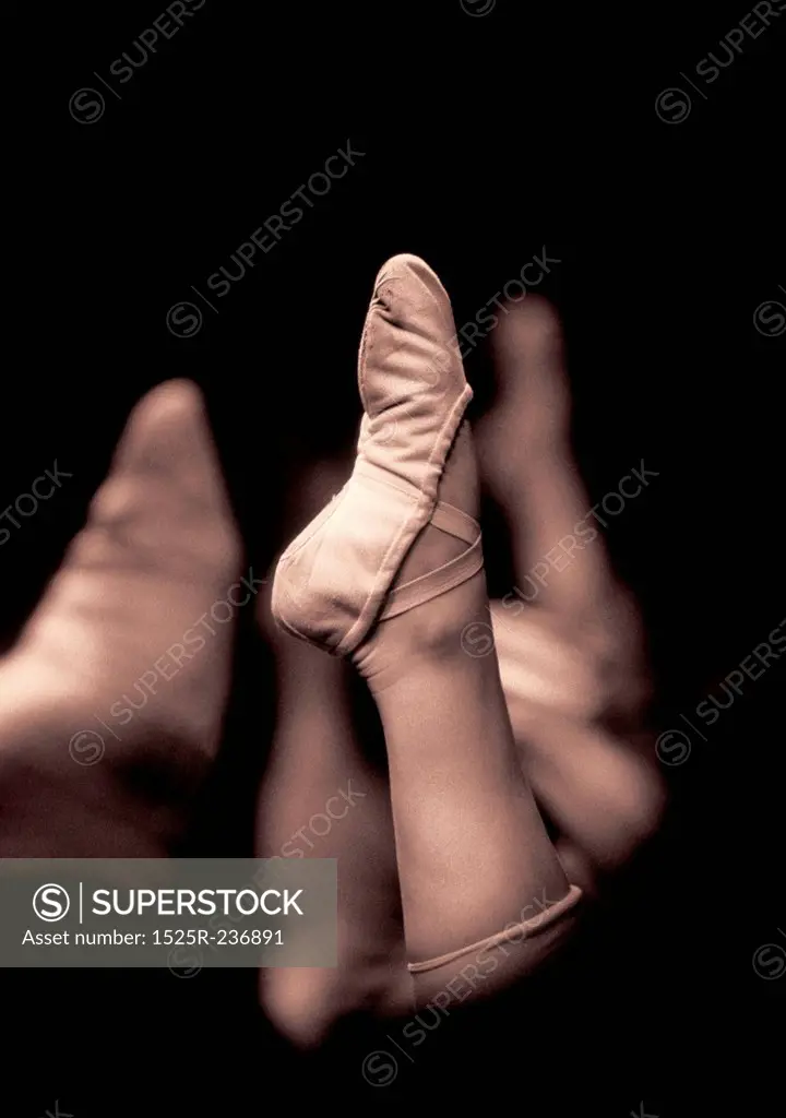Pointing Feet in Ballet Slippers
