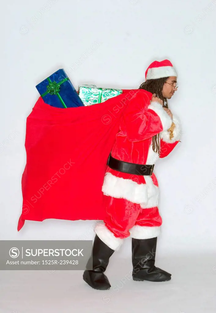 Black Santa Carrying Bag of Presents