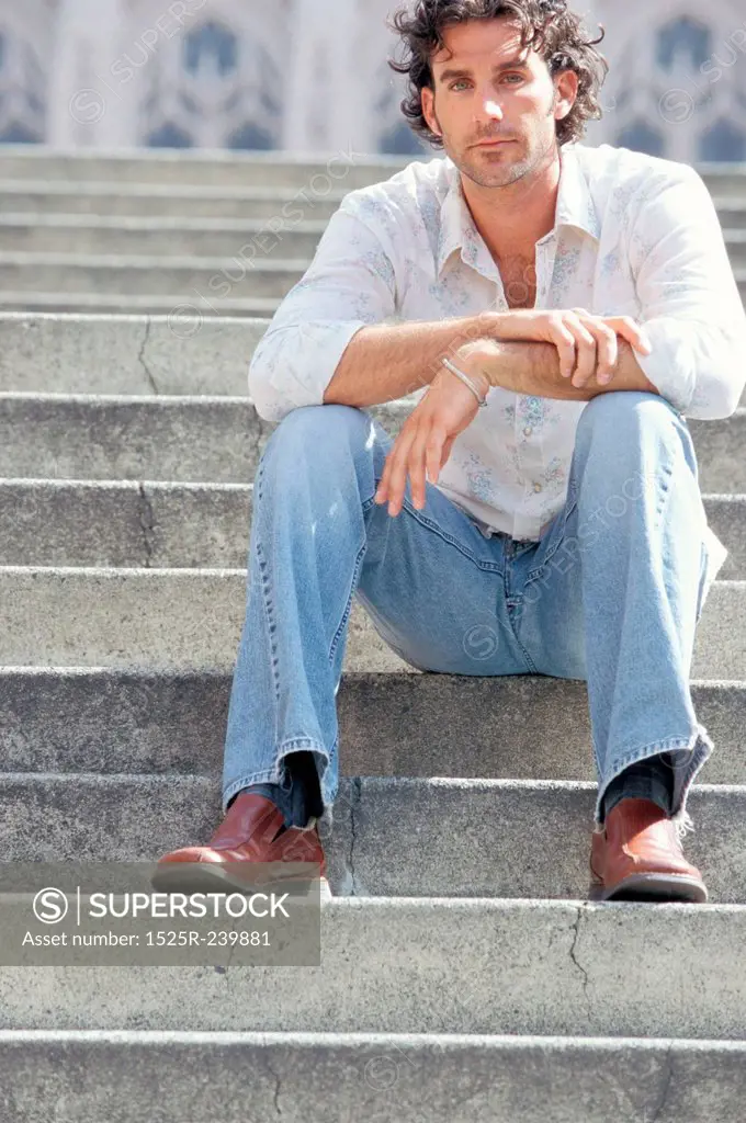 Man Waiting on Steps