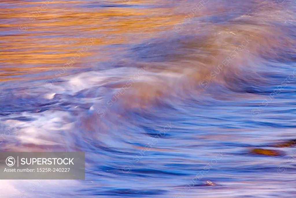 Blurred motion of ocean waves at beach
