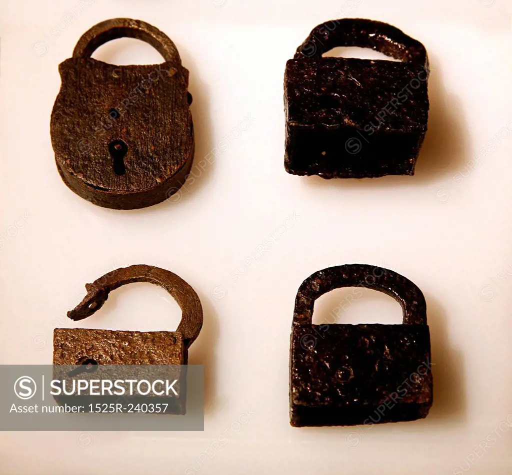 Close up detail of old-fashioned metal padlocks
