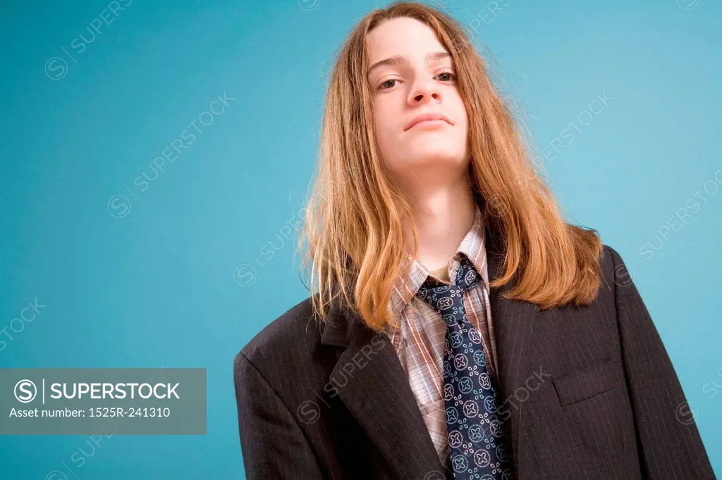 Teen Boy in Ill-fitting Suit