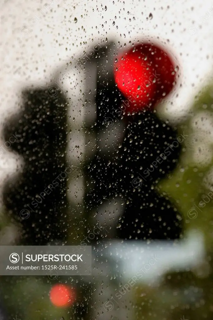 Stop Lights Through Rainy Window