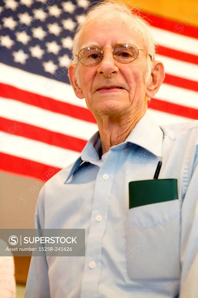Elderly Man with American Flag and Checkbook