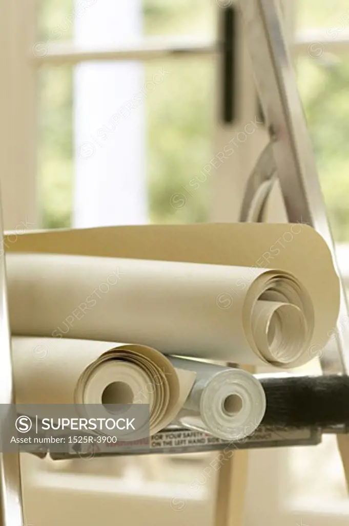 Close-up of rolls of wallpapers