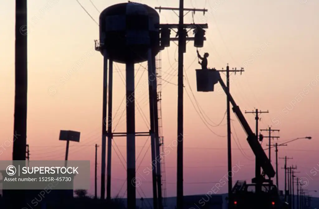 Working on a Telephone Pole