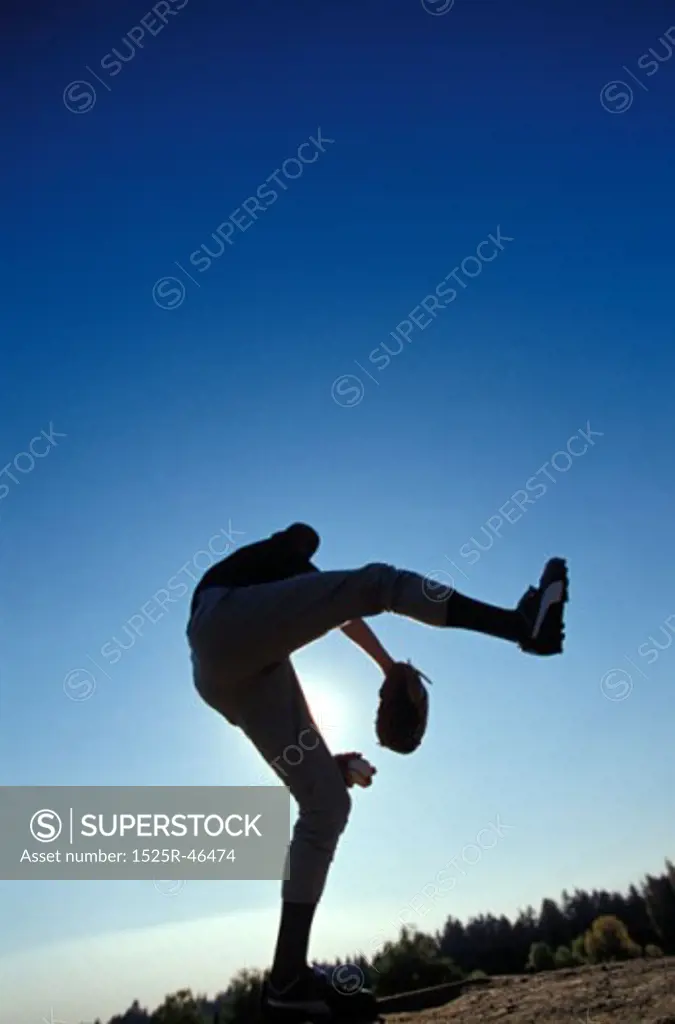 Pitcher Throwing a Baseball