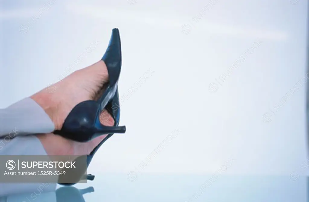 Close-up of a woman's feet wearing high heels