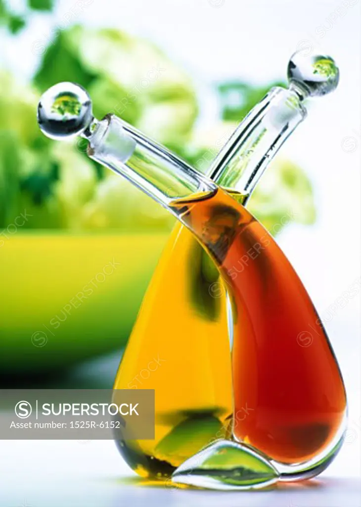 Close-up of bottles of vinegar and olive oil