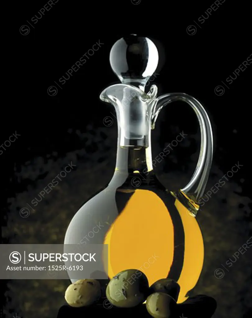 Close-up of olive oil in a decanter