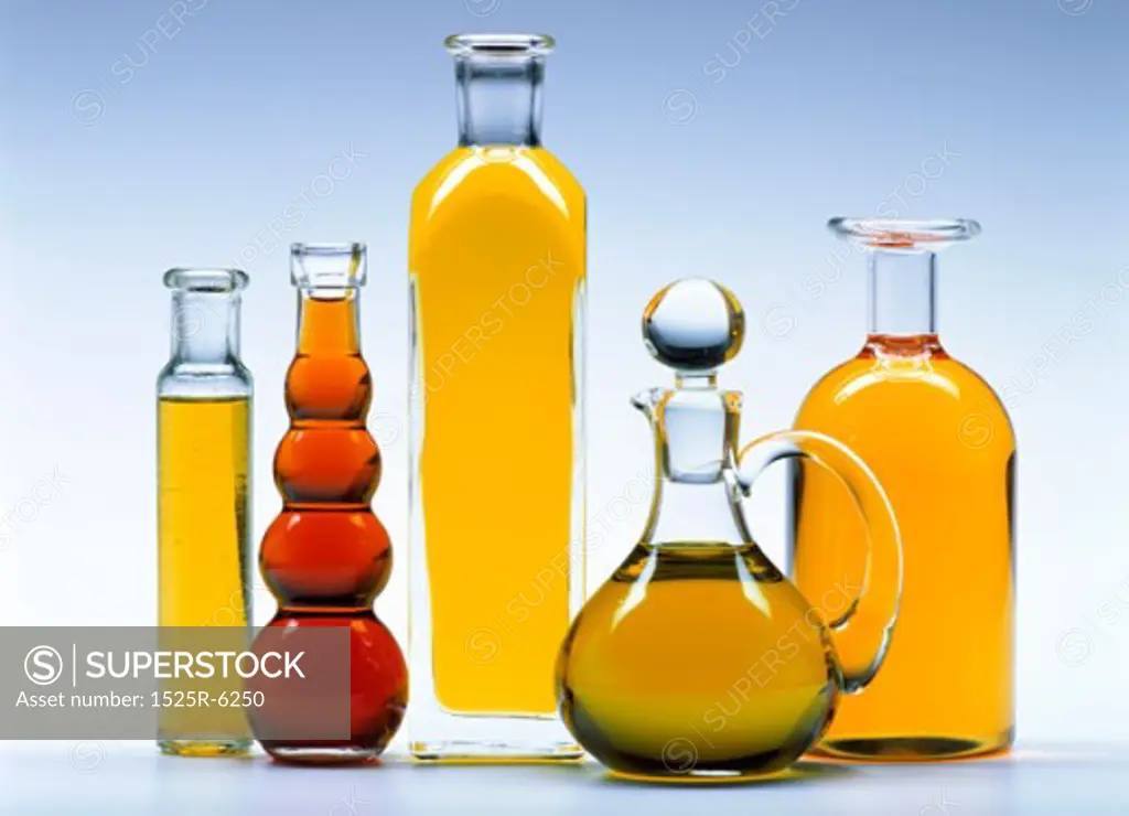 Close-up of bottles of olive oils