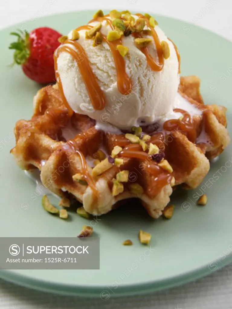 Close-up of a waffle with vanilla ice cream on a plate