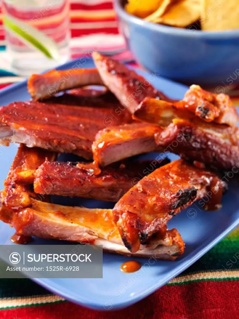 Close-up of barbecued ribs on a tray
