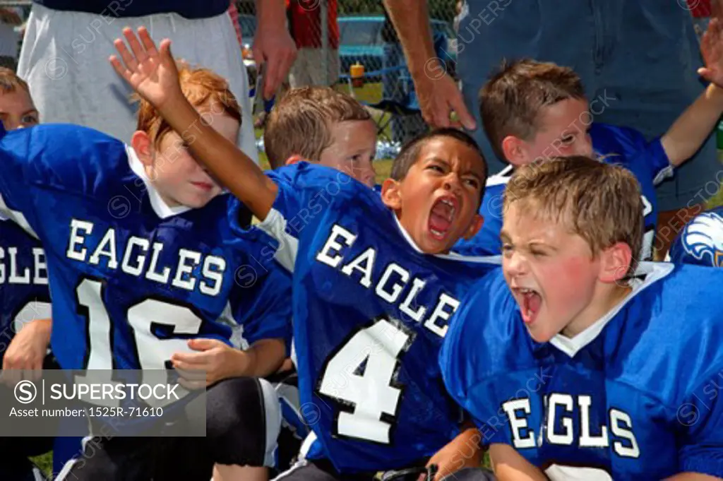 Young Football Players Screaming On The Sidelines