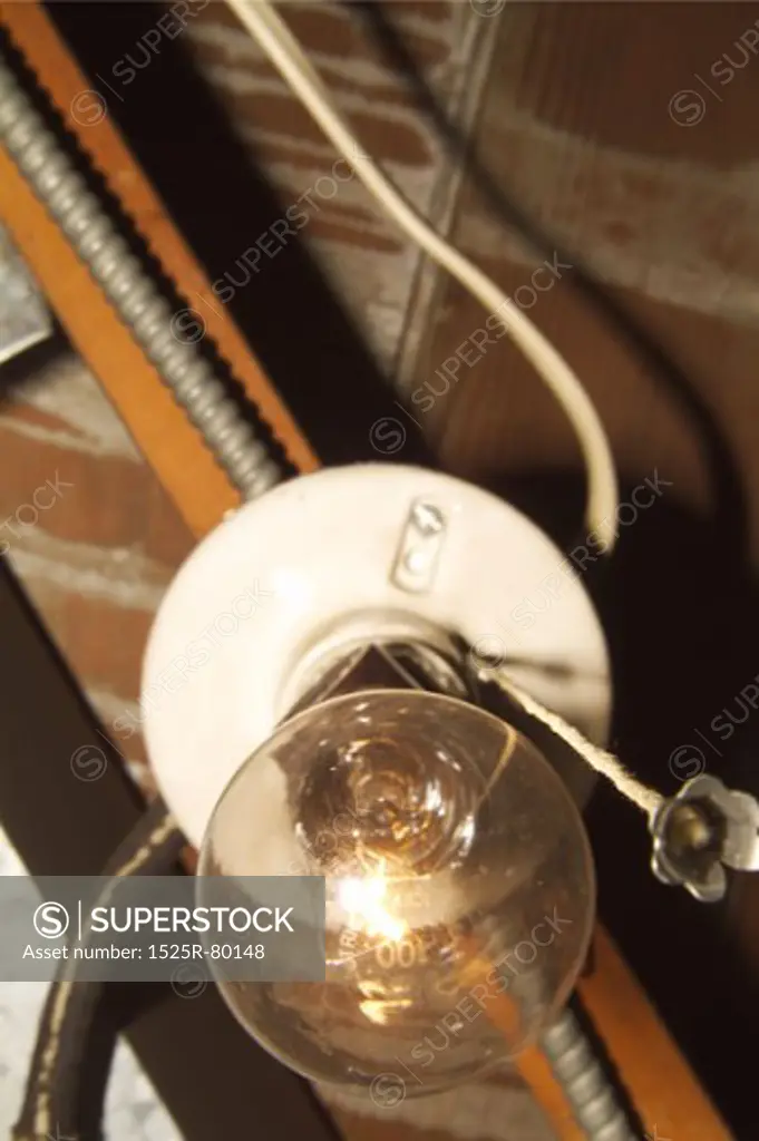 Low angle view of a light bulb lit up