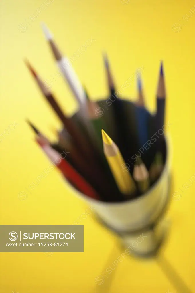 Close-up of colored pencils in a container