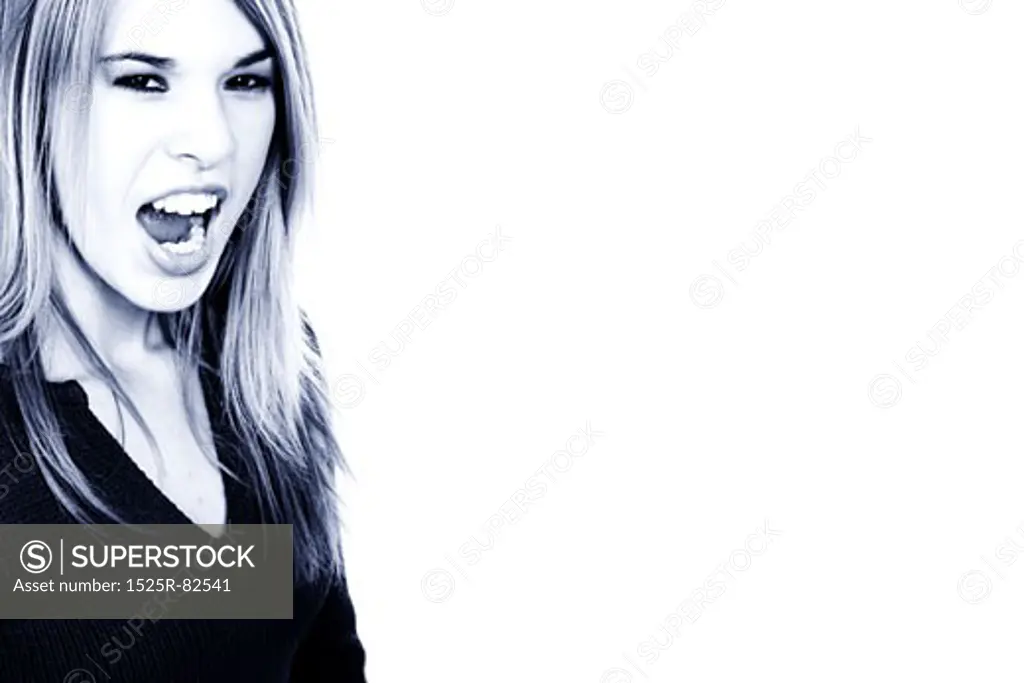 Portrait of a young woman shouting