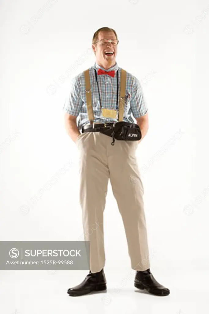 Caucasian young man dressed like nerd smiling with eyes closed.