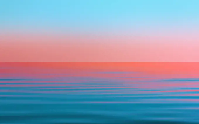 Reflection of the sunset in the flowing water. Abstract turquoise blue and pink seascape background with motion blur filter. Pantone color of the year 2019 - Living Coral. Space for copy and design.