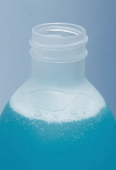Bottle of turquoise lotion
