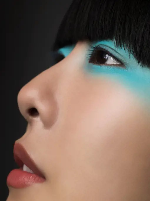 Woman with turquoise eyeshadow