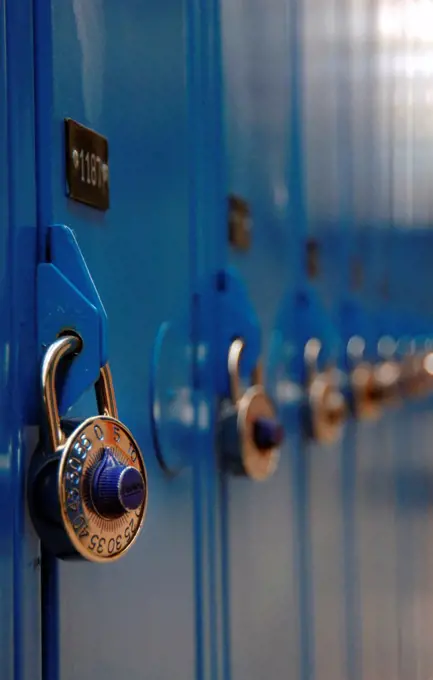 Close up of padlocks on blue school lockers