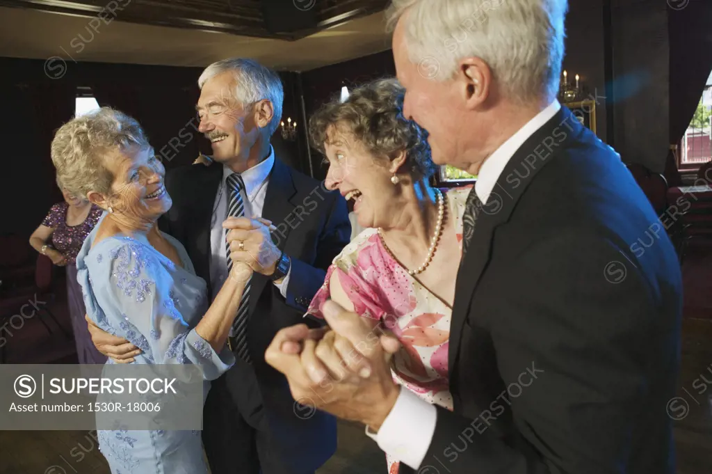 Senior couples on the dance floor.