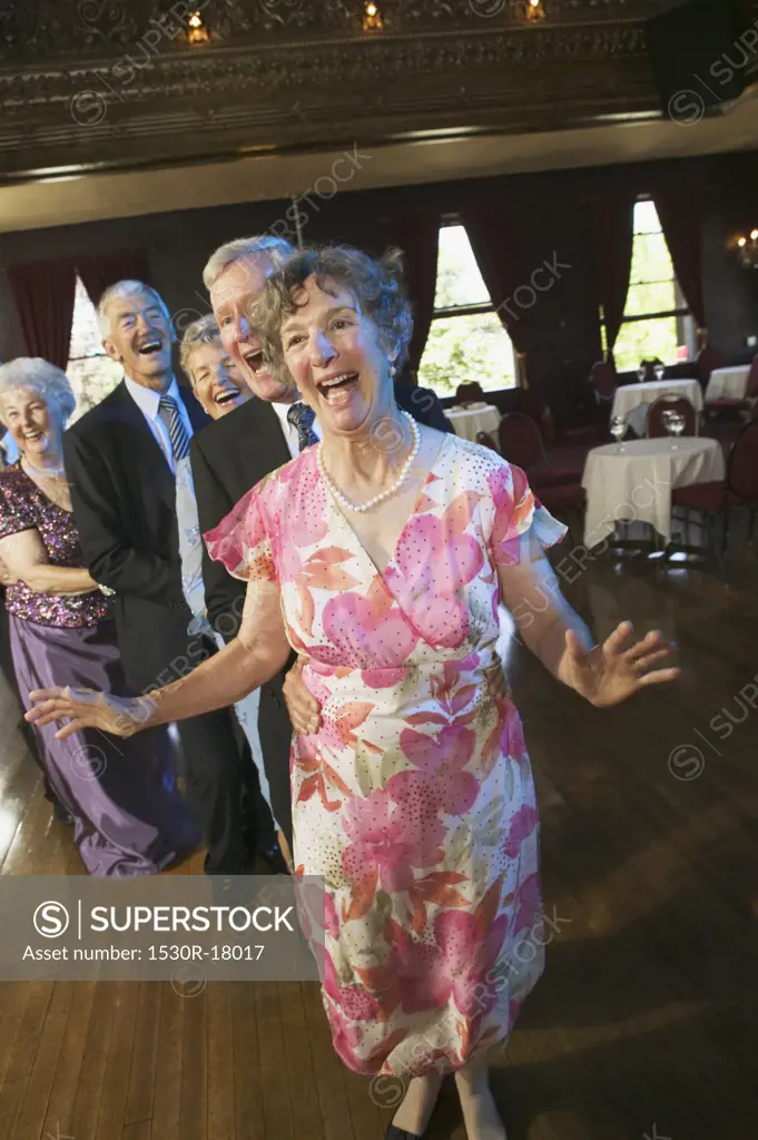 Seniors doing the bunny hop dance.