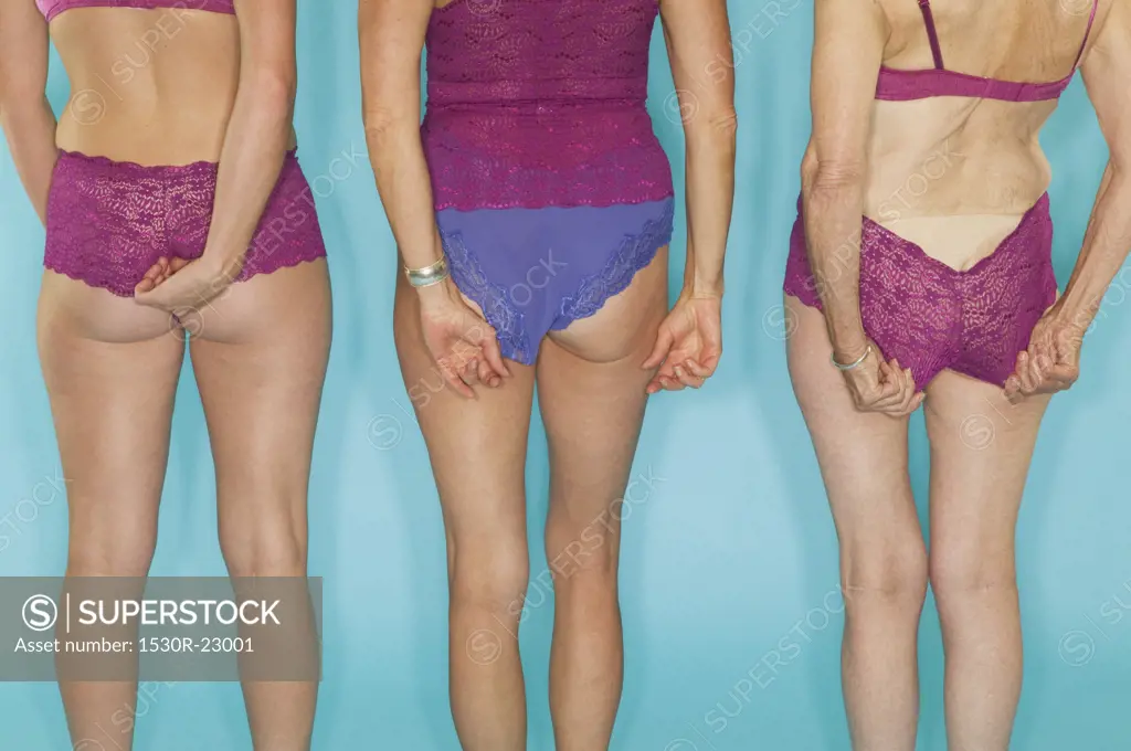 Three women modeling lingerie