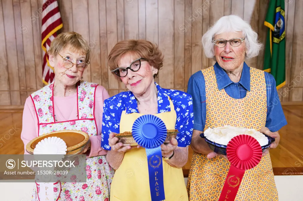 Women with prizes for homemade pies
