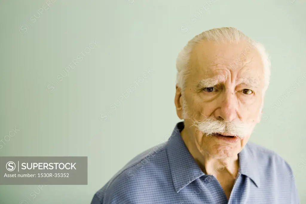 Portrait of concerned older man