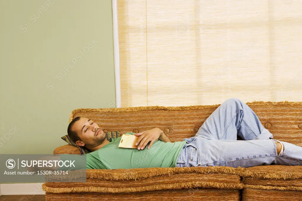 Man asleep on sofa