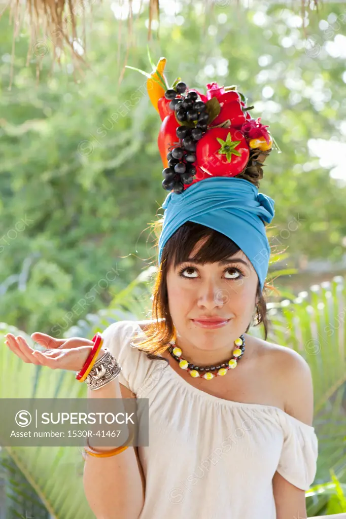 young woman wearing fruit hat