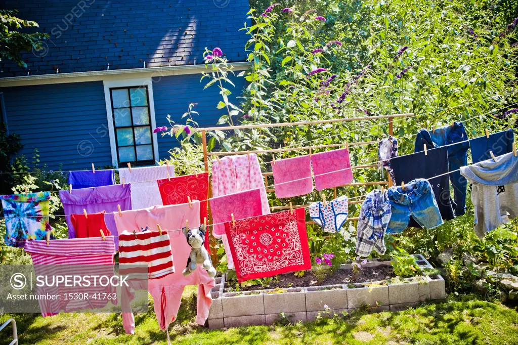Colorful laundry hanging on outdoor lines,