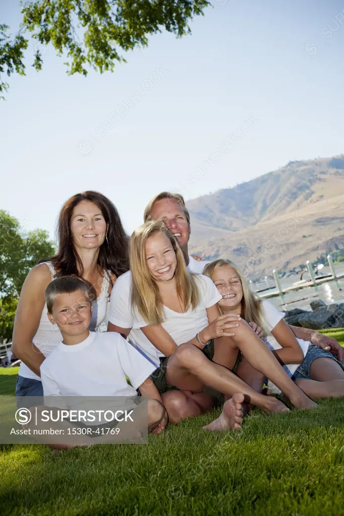 Outdoor portrait of family of five,