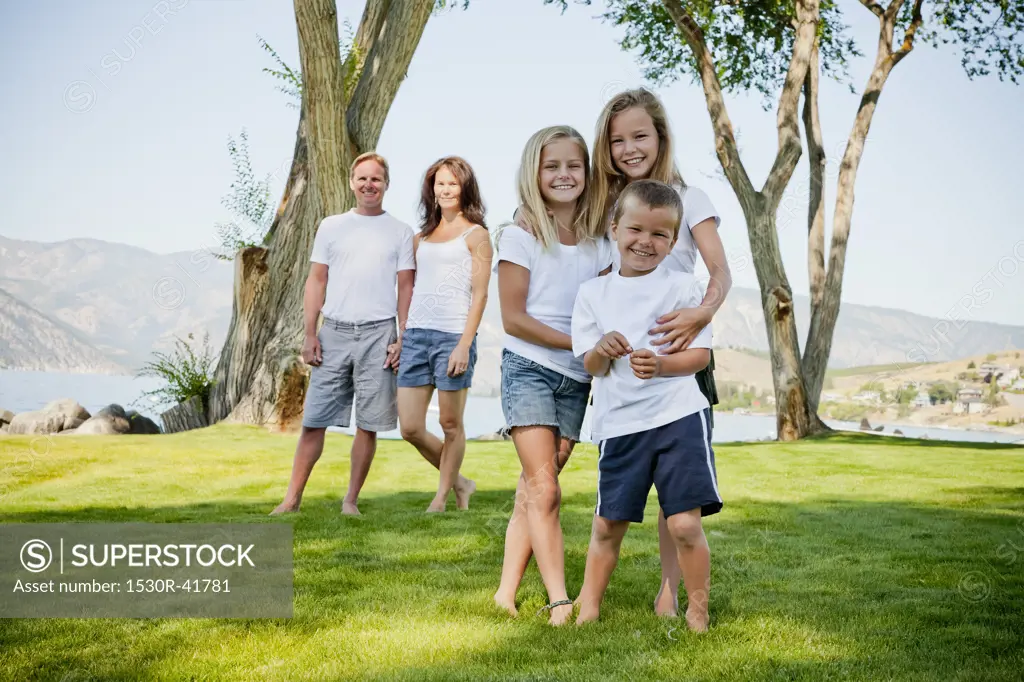 Outdoor portrait of family of five,