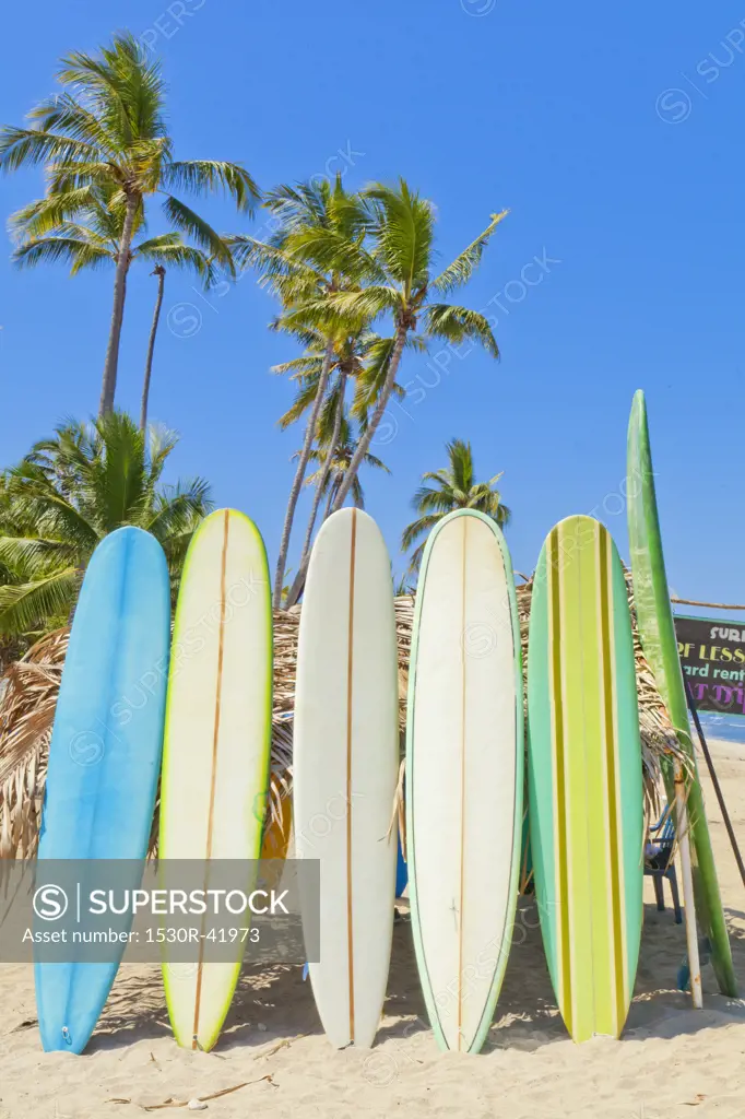 Row of surf boards on beach in Mexico,  Sayulita, Mexico